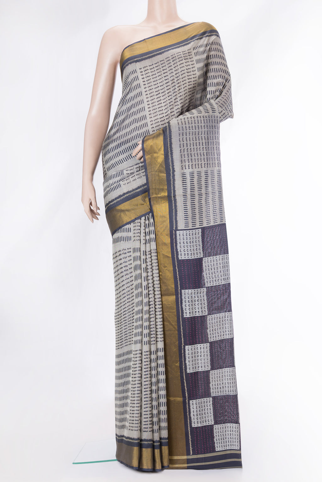 Grey Dual Tone Rajkot Patola Silk Saree with Ikat Print on the body and Zari Border.  displayed on a mannequin