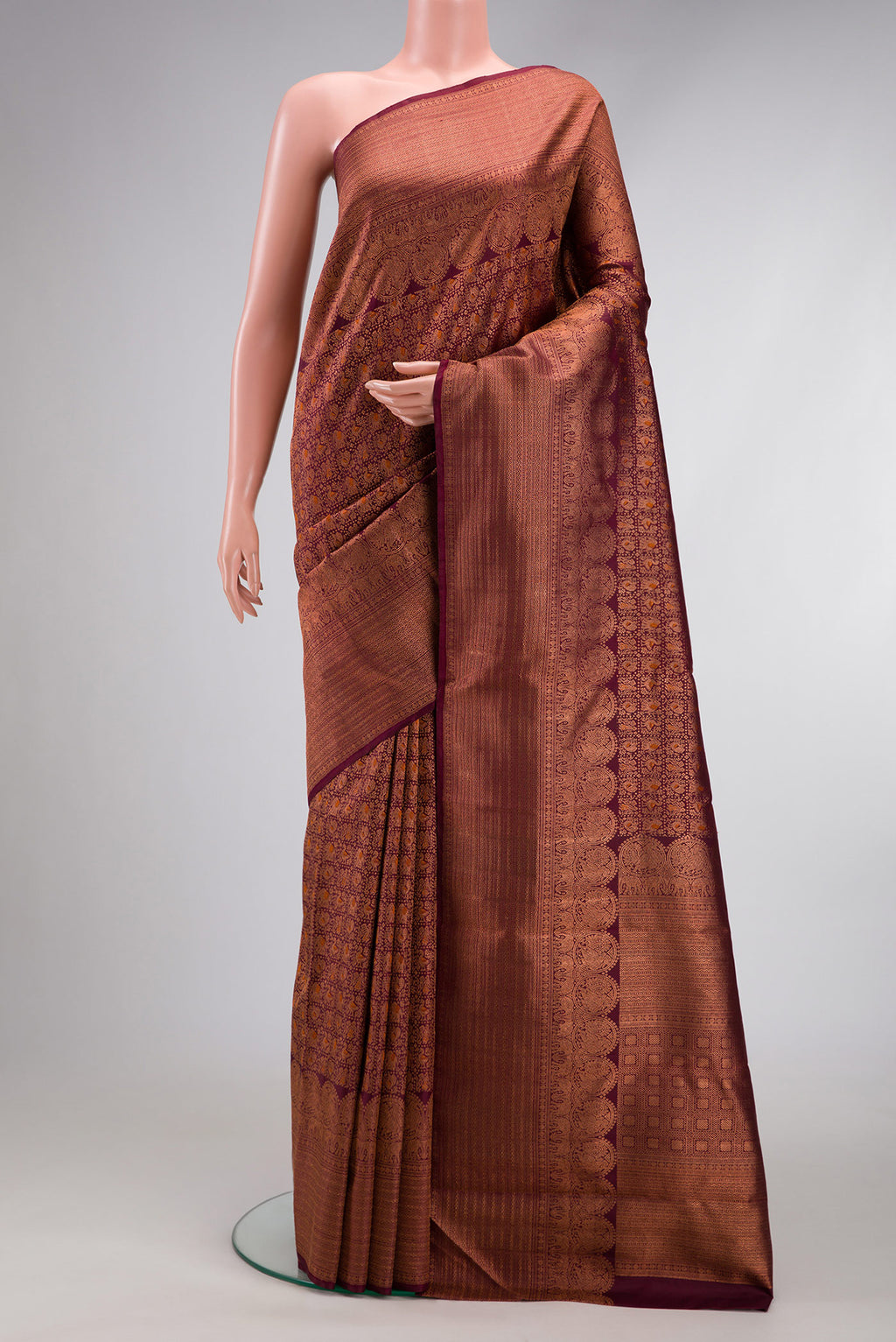 Coffee Brown Dual Tone Kanchipuram Silk Saree with Zari Brocade on the body and Fancy Border.  displayed on a mannequin
