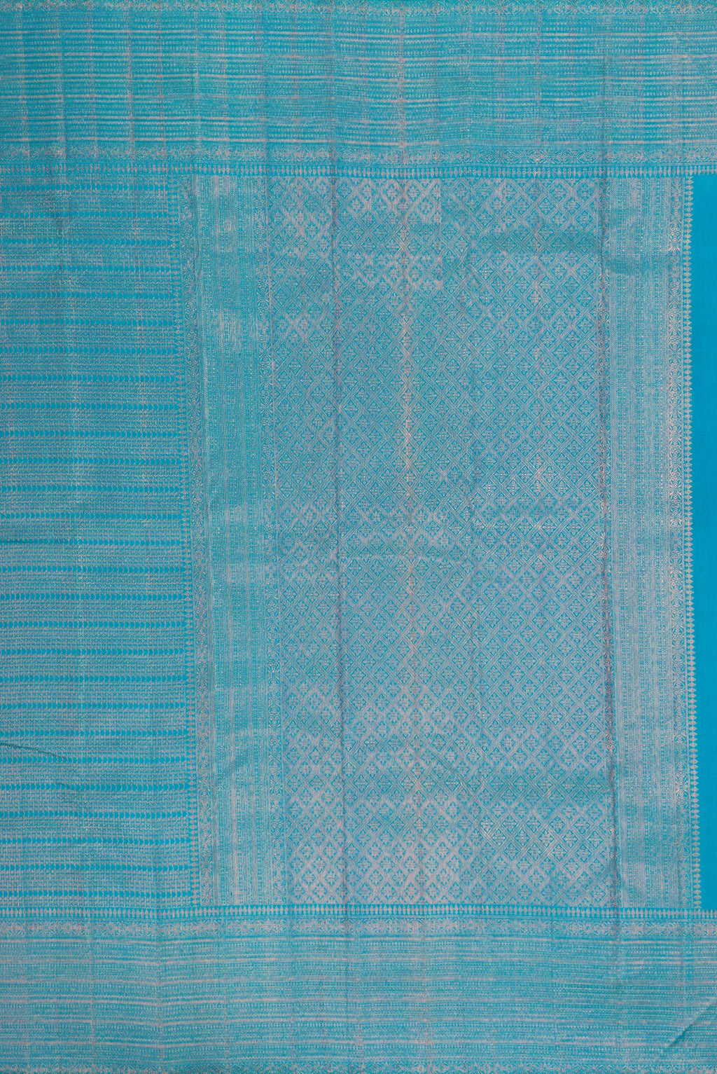 Close up image of the pallu of Peacock Blue Dual Tone Kanjivaram Silk Saree with Zari Brocade on the body and Fancy Border. 