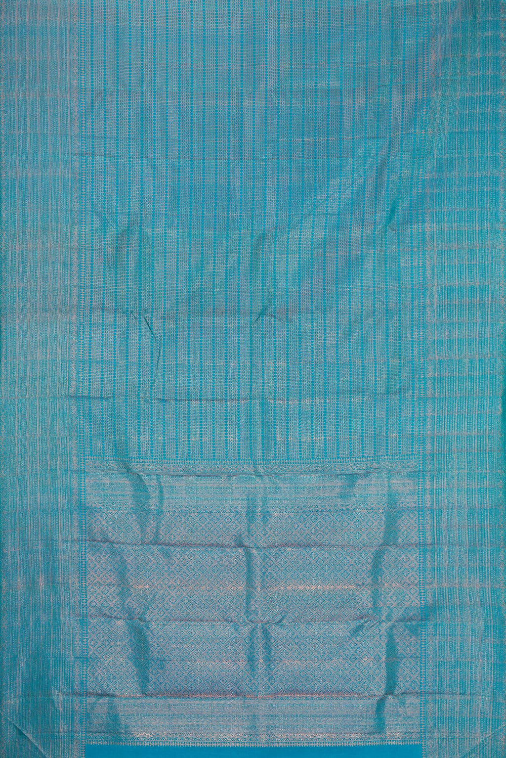 Flat view of Peacock Blue Dual Tone Kanjivaram Silk Saree with Zari Brocade on the body and Fancy Border. 