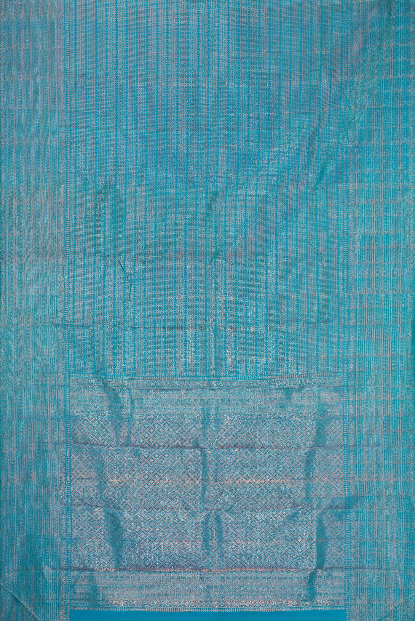 Flat view of Peacock Blue Dual Tone Kanjivaram Silk Saree with Zari Brocade on the body and Fancy Border. 