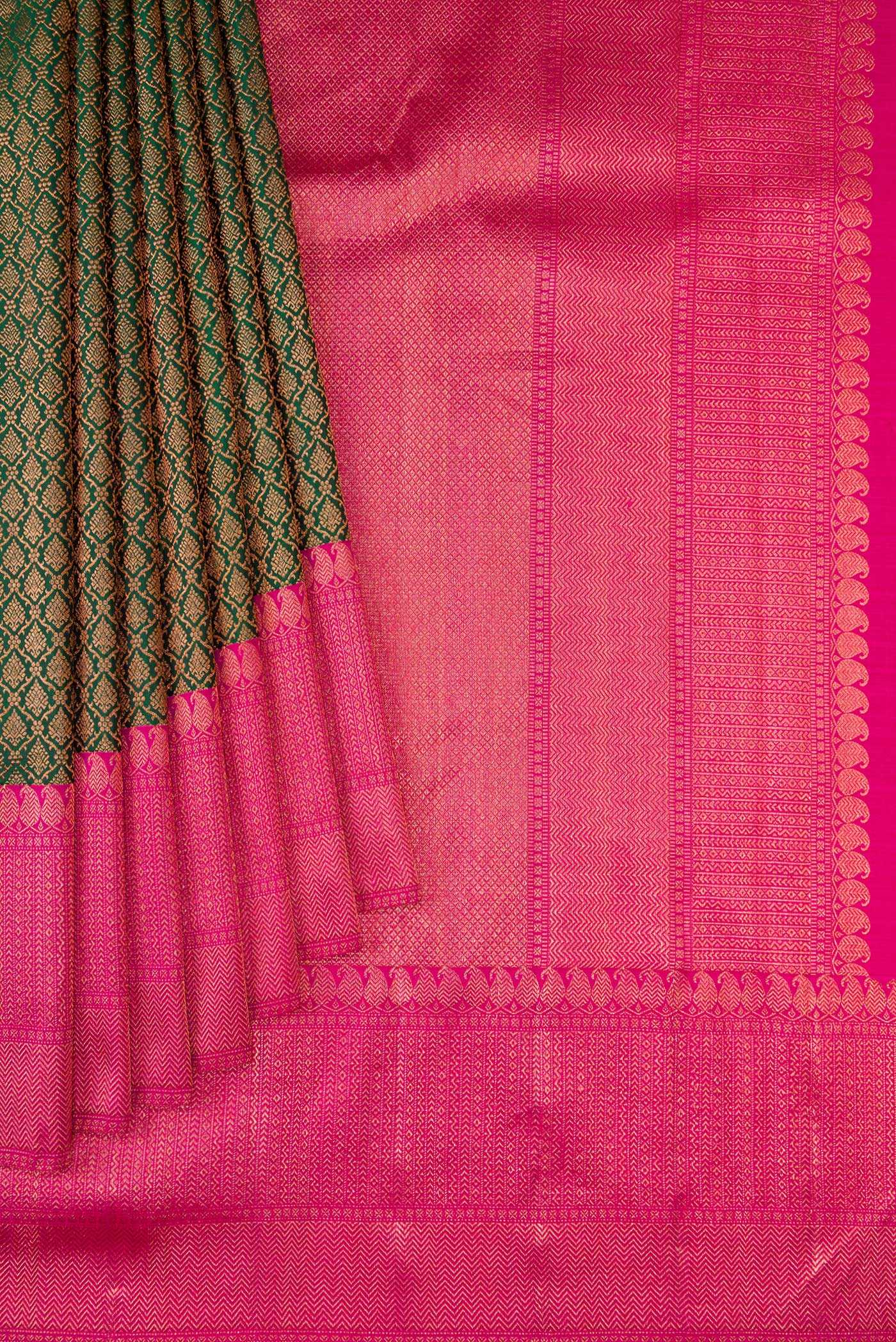 Pleats and pallu of Bottle Green Dual Tone Kanchipuram Silk Saree with Zari Brocade on the body and Zari Border. 