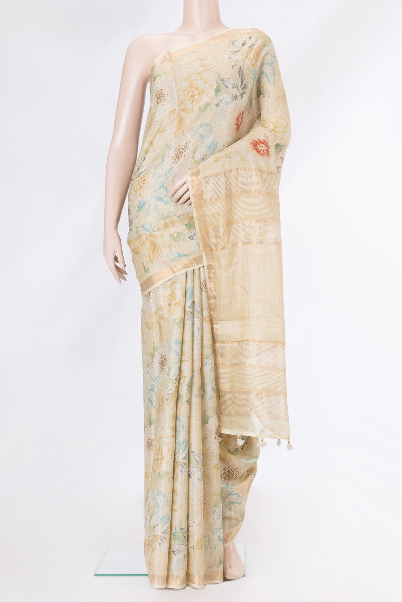 Beige Dual Tone Tussar Silk Saree with Printed design on the body and Zari Border.  displayed on a mannequin