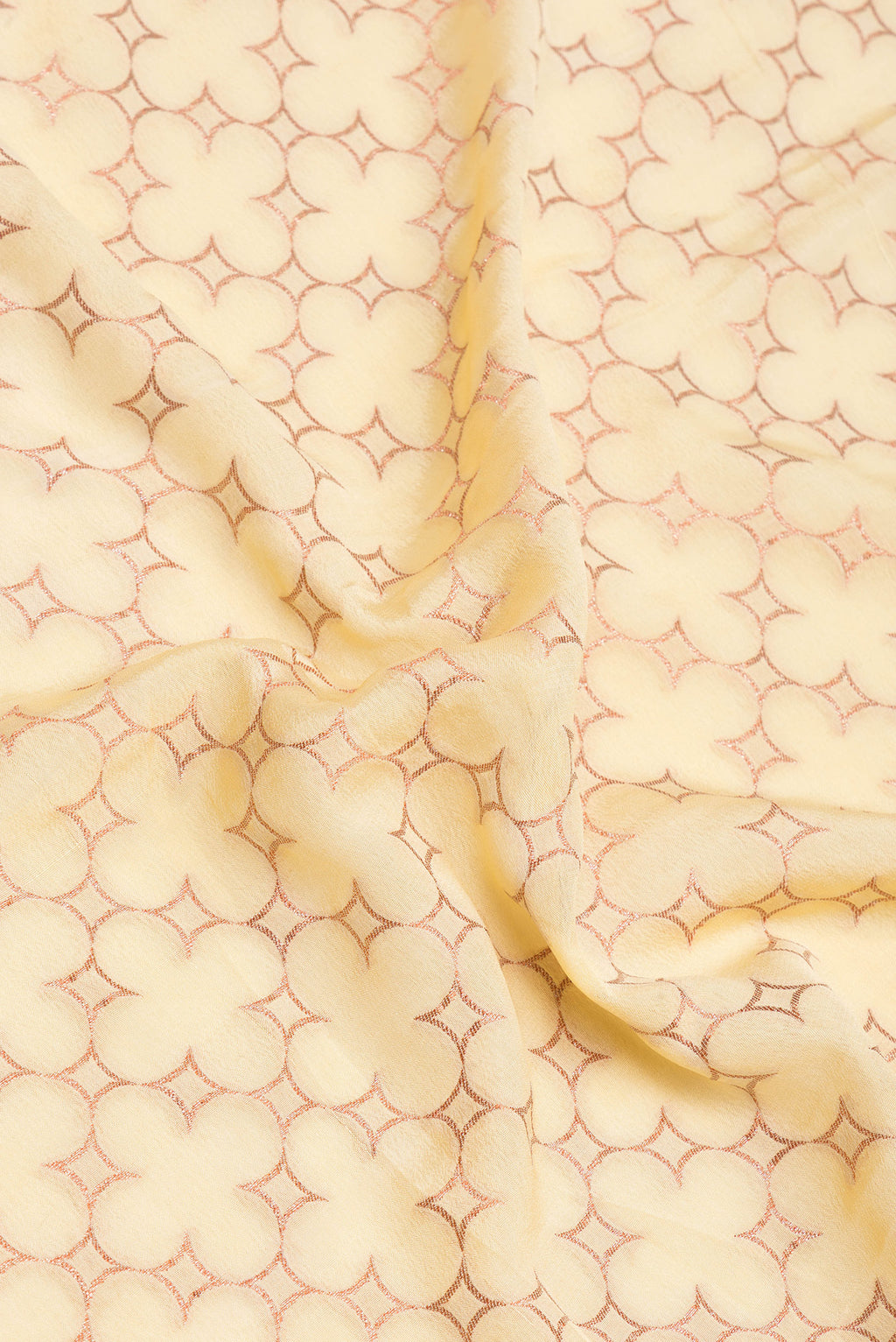Close up of Sandal Banarasi Georgette Saree with Zari Brocade on the body and Zari Border.  displaying folds