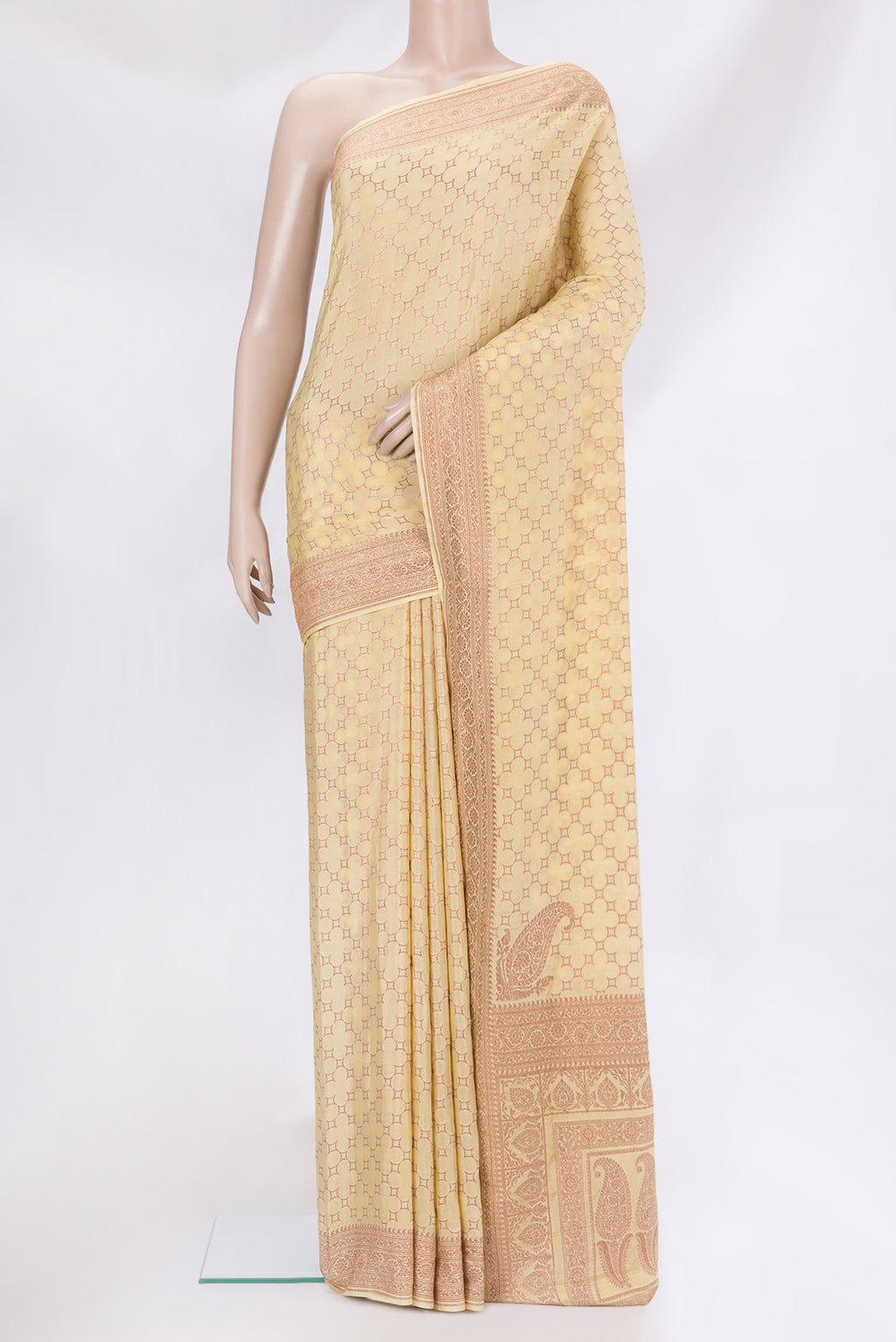 Sandal Banarasi Georgette Saree with Zari Brocade on the body and Zari Border.  displayed on a mannequin