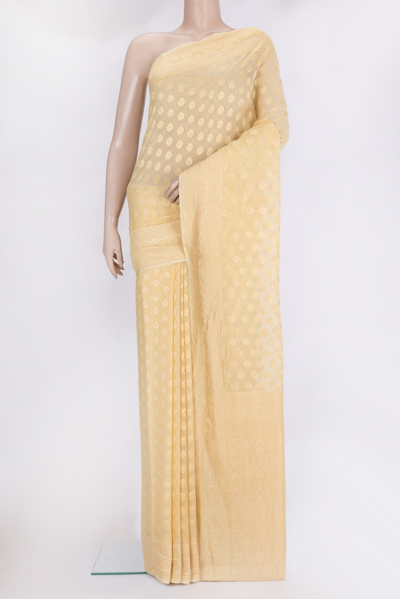 Sandal Dual Tone Banarasi Georgette Saree with Zari Butta on the body and Zari Border.  displayed on a mannequin