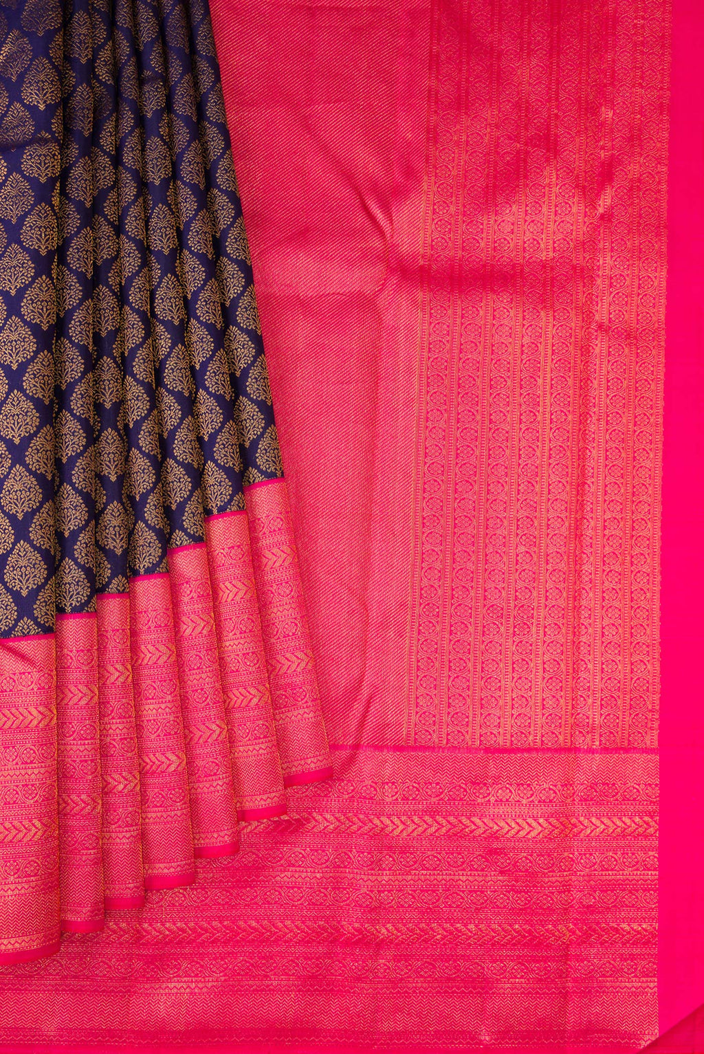 Pleats and pallu of Navy Blue Dual Tone Kanchipuram Silk Saree with Zari Brocade on the body and Zari Border. 