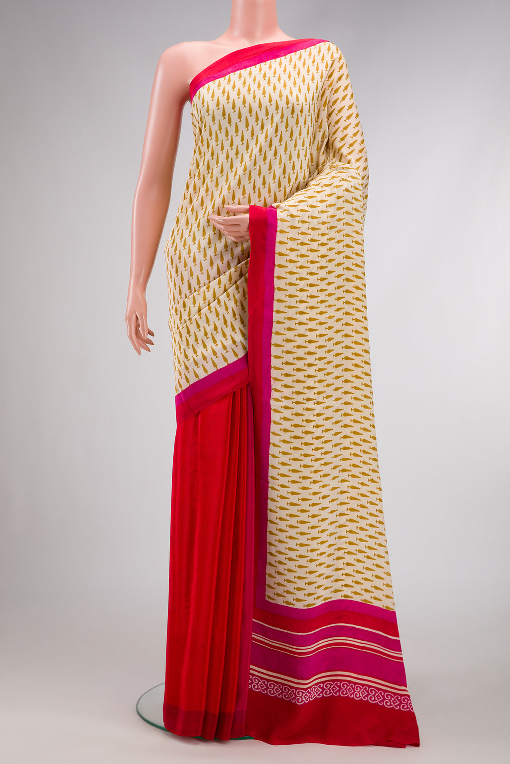 Sandal Dual Tone Mysore Crepe Saree with Printed design on the body and Plain Border.  displayed on a mannequin