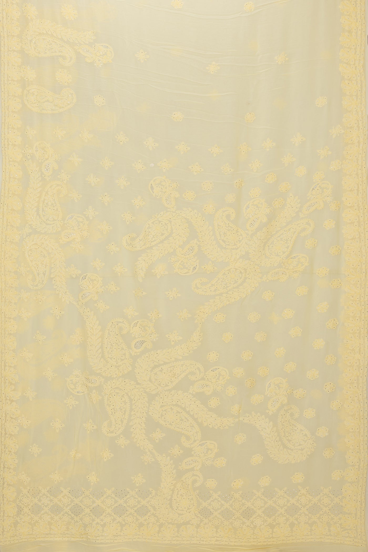 Flat view of Yellow Georgette Saree with Embroidery on the body and Embroidery Border. 