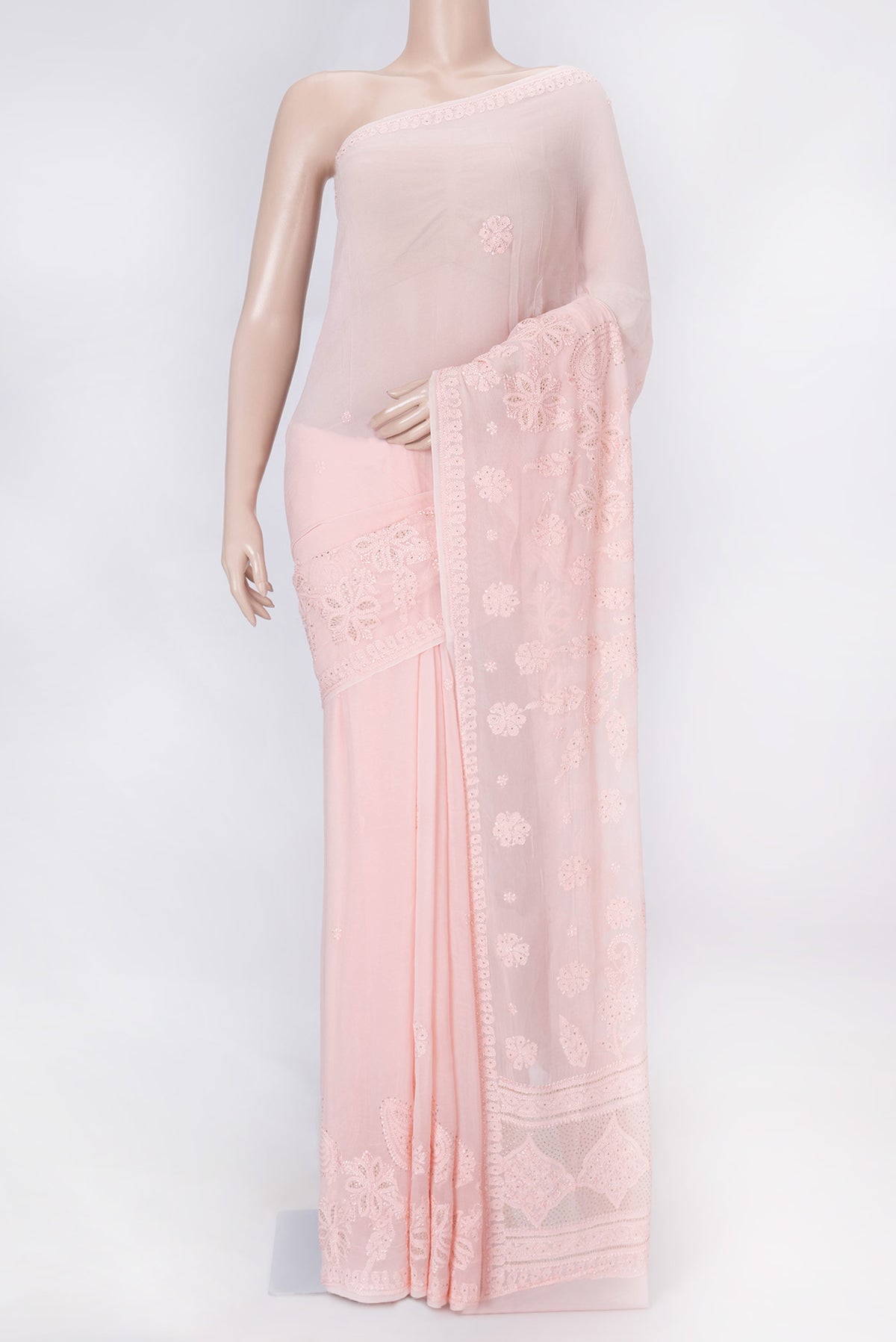 Rose pink Dual Tone Mysore Georgette Saree with Embroidery on the body and Embroidery Border displayed on a mannequin