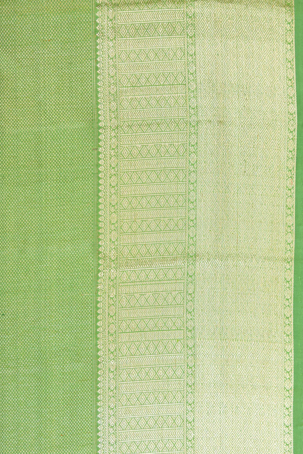 Border image of Pista Green Dual Tone Kanchipuram Silk Saree with Zari Brocade on the body and Zari Border. 