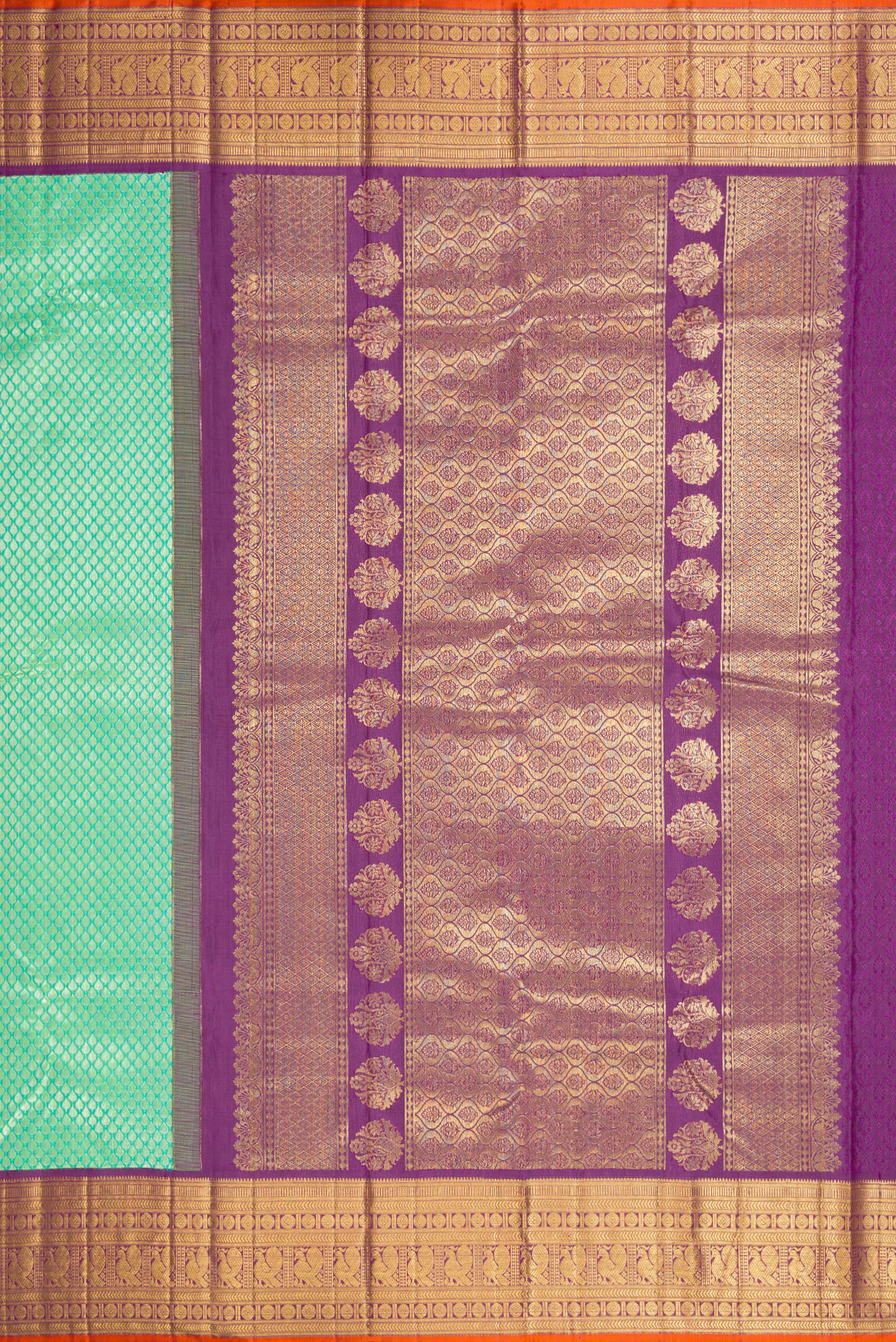 Close up image of the pallu of Sea Green Dual Tone Kanchipuram Silk Saree with Zari Brocade on the body and Zari Border. 