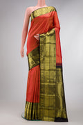 Red Dual Tone Kanchipuram Silk Saree with Zari Brocade on the body and Zari Border.  displayed on a mannequin