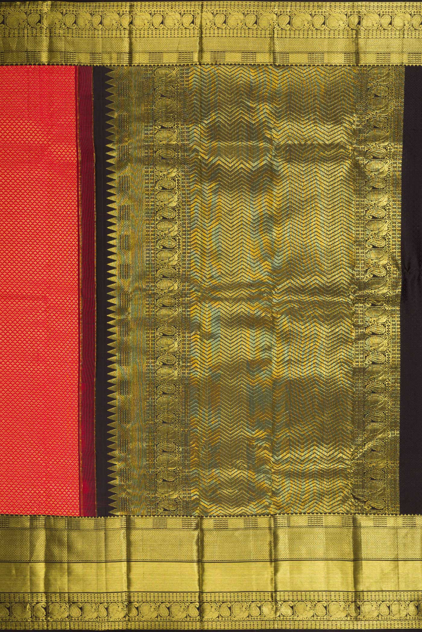 Close up image of the pallu of Red Dual Tone Kanchipuram Silk Saree with Zari Brocade on the body and Zari Border. 