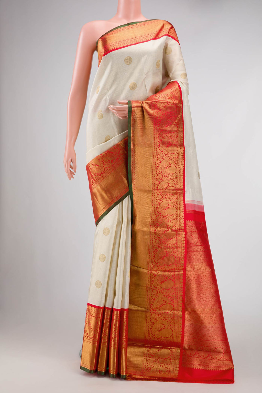 Pure Silk Pure Zari Off White Dual Tone Kanchipuram Saree with Zari Butta on the body and Zari Border displayed on a mannequin