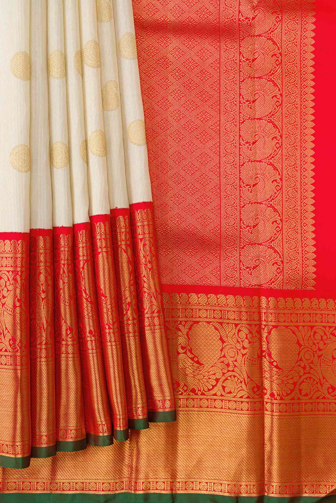 Pleats and pallu of Pure Silk Pure Zari Off White Dual Tone Kanchipuram Saree with Zari Butta on the body and Zari Border
