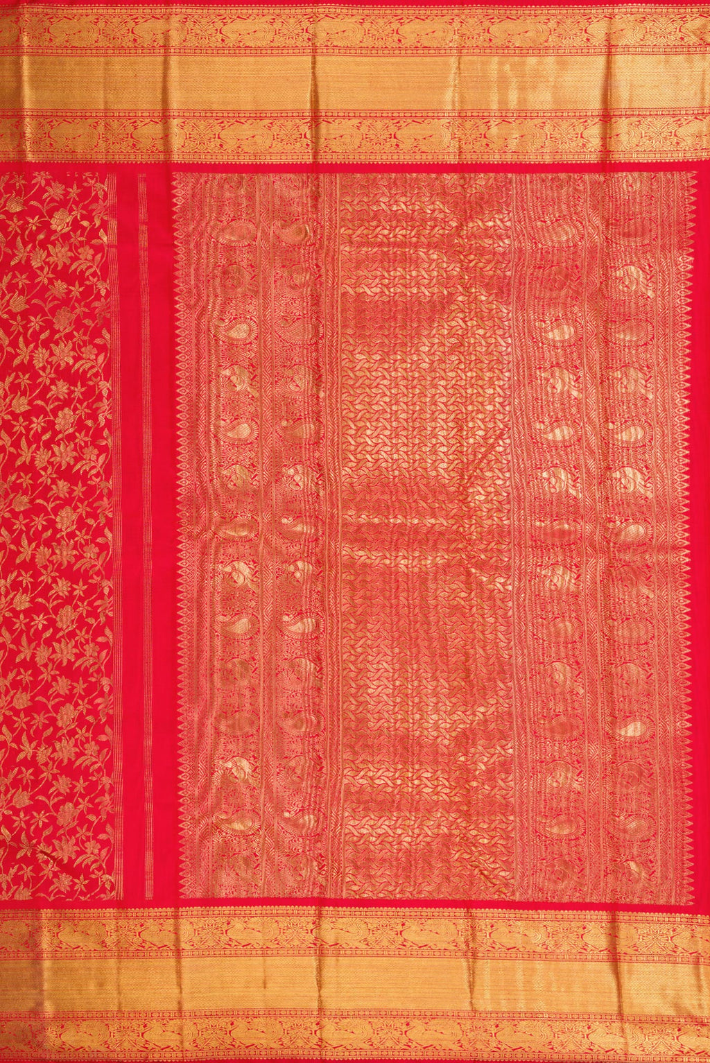 Close up image of the pallu of Pure Silk Pure Zari Red Dual Tone Kanjivaram Saree with Zari Brocade on the body and Zari Border. 