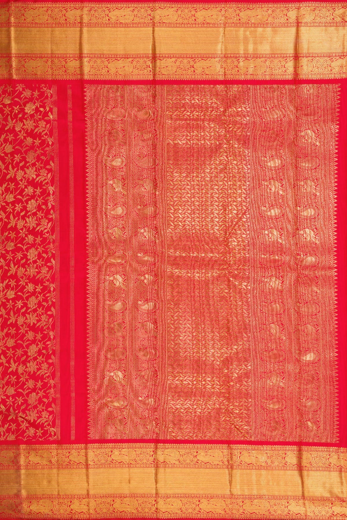 Close up image of the pallu of Pure Silk Pure Zari Red Dual Tone Kanjivaram Saree with Zari Brocade on the body and Zari Border. 
