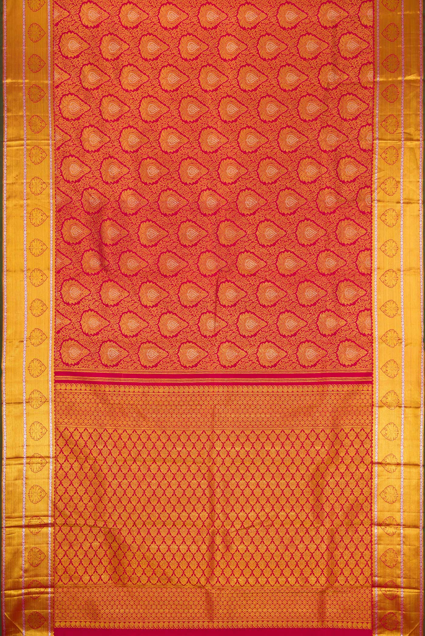 Flat view of Maroon Dual Tone Kanjivaram Silk Saree with Zari Brocade on the body and Zari Border. 