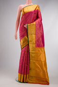 Pure Silk Pure Zari Magenta Dual Tone Kanjivaram Saree with Zari Brocade on the body and Zari Border.  displayed on a mannequin