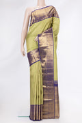 Pure Silk Pure Zari Pista Green Dual Tone Kanjivaram Saree with Zari Brocade on the body and Zari Border.  displayed on a mannequin