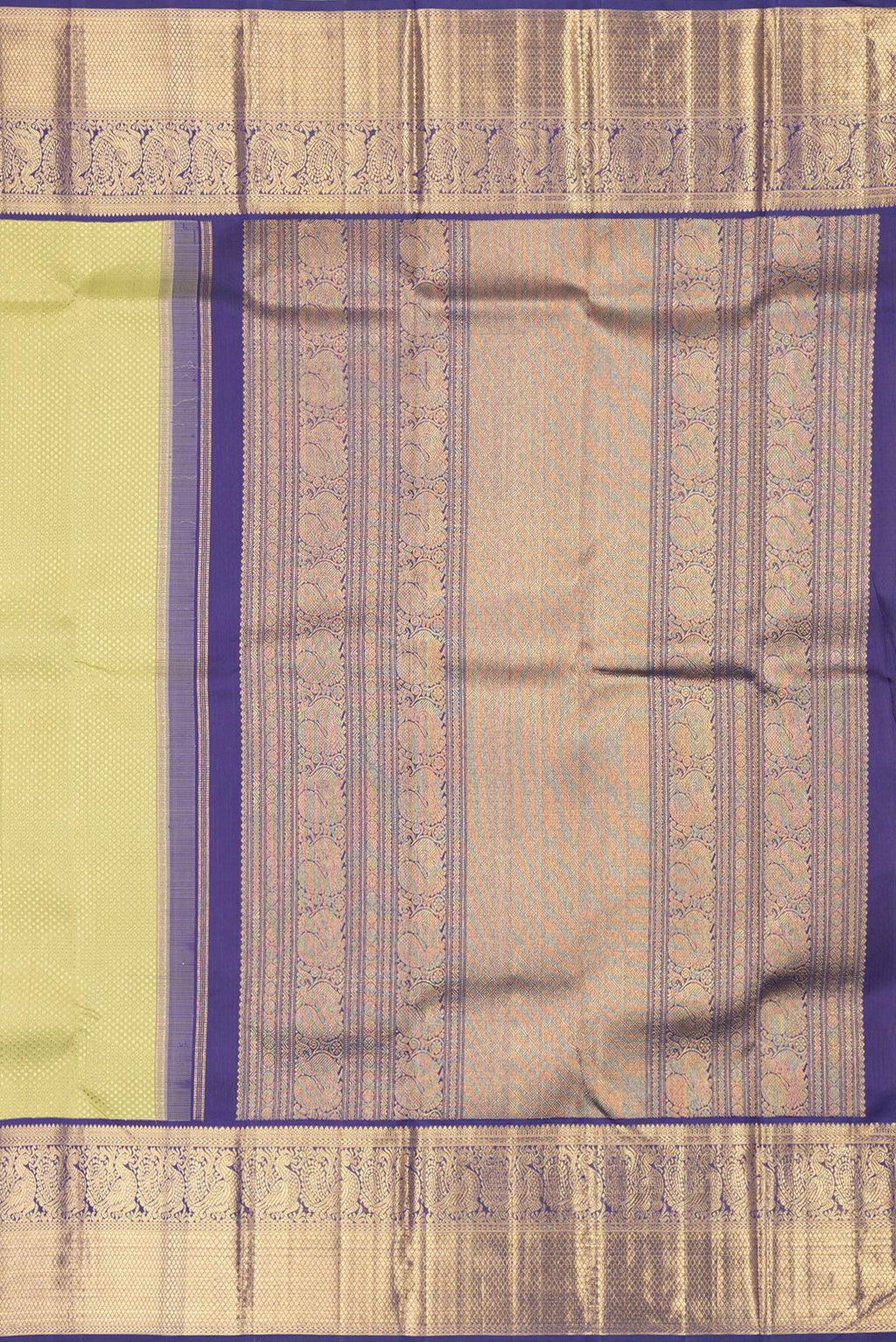 Close up image of the pallu of Pure Silk Pure Zari Pista Green Dual Tone Kanjivaram Saree with Zari Brocade on the body and Zari Border. 