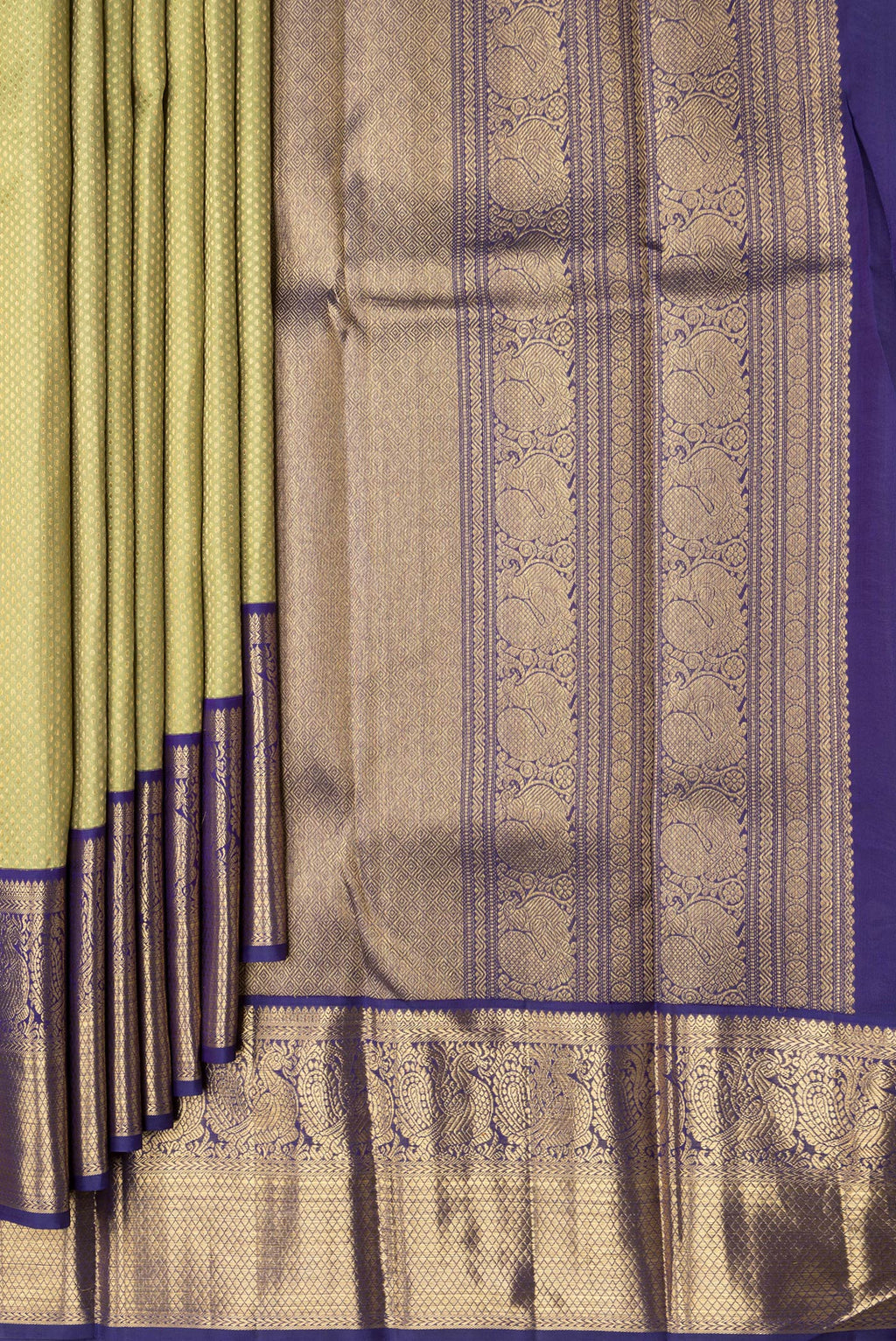 Pleats and pallu of Pure Silk Pure Zari Pista Green Dual Tone Kanjivaram Saree with Zari Brocade on the body and Zari Border. 