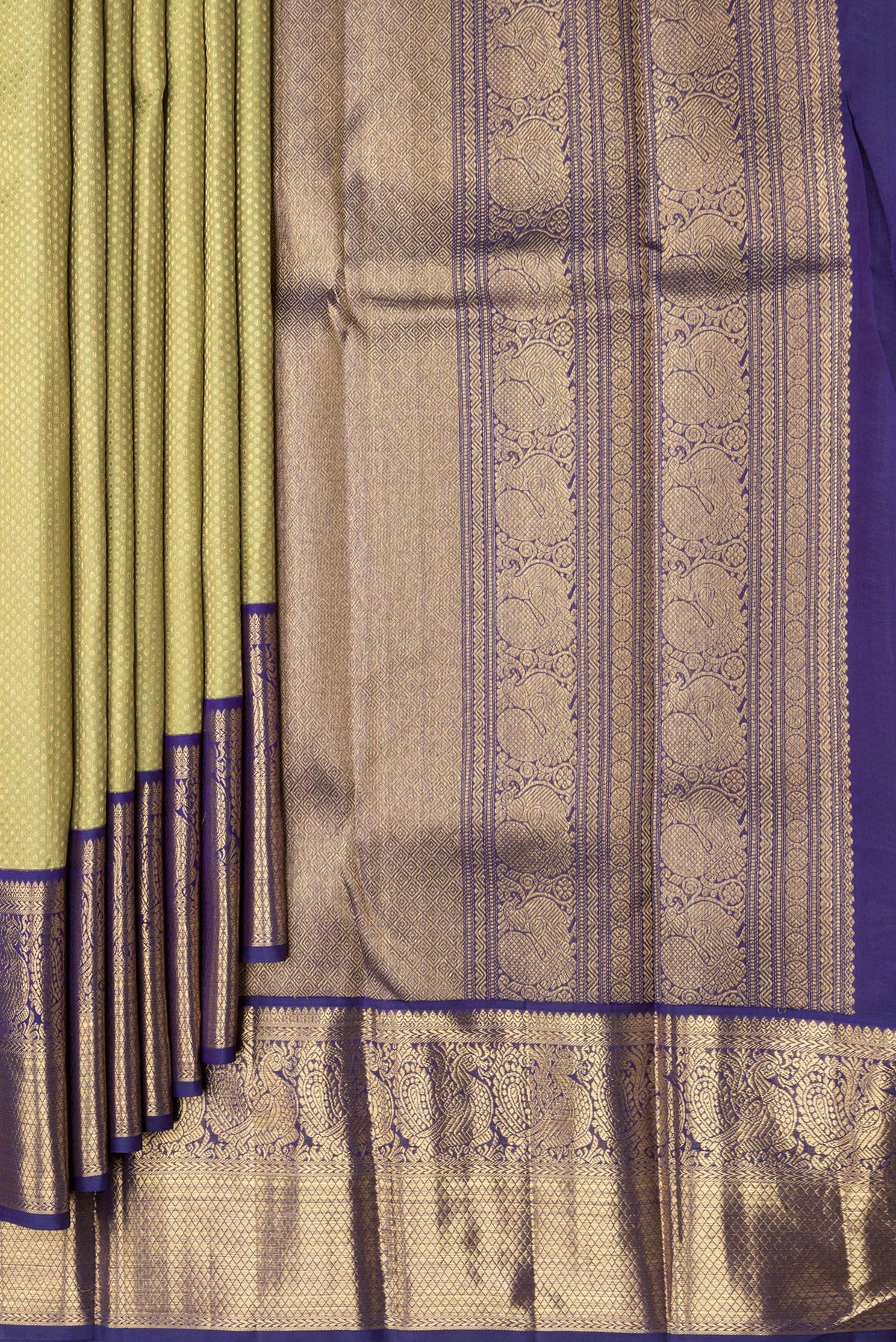 Pleats and pallu of Pure Silk Pure Zari Pista Green Dual Tone Kanjivaram Saree with Zari Brocade on the body and Zari Border. 