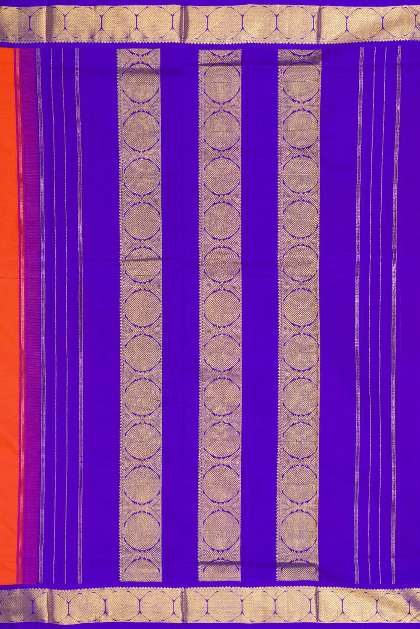 Close up image of the pallu of Pure Silk Pure Zari Orange Kanchipuram Nine Yards Saree with Plain Body and Zari Border. 