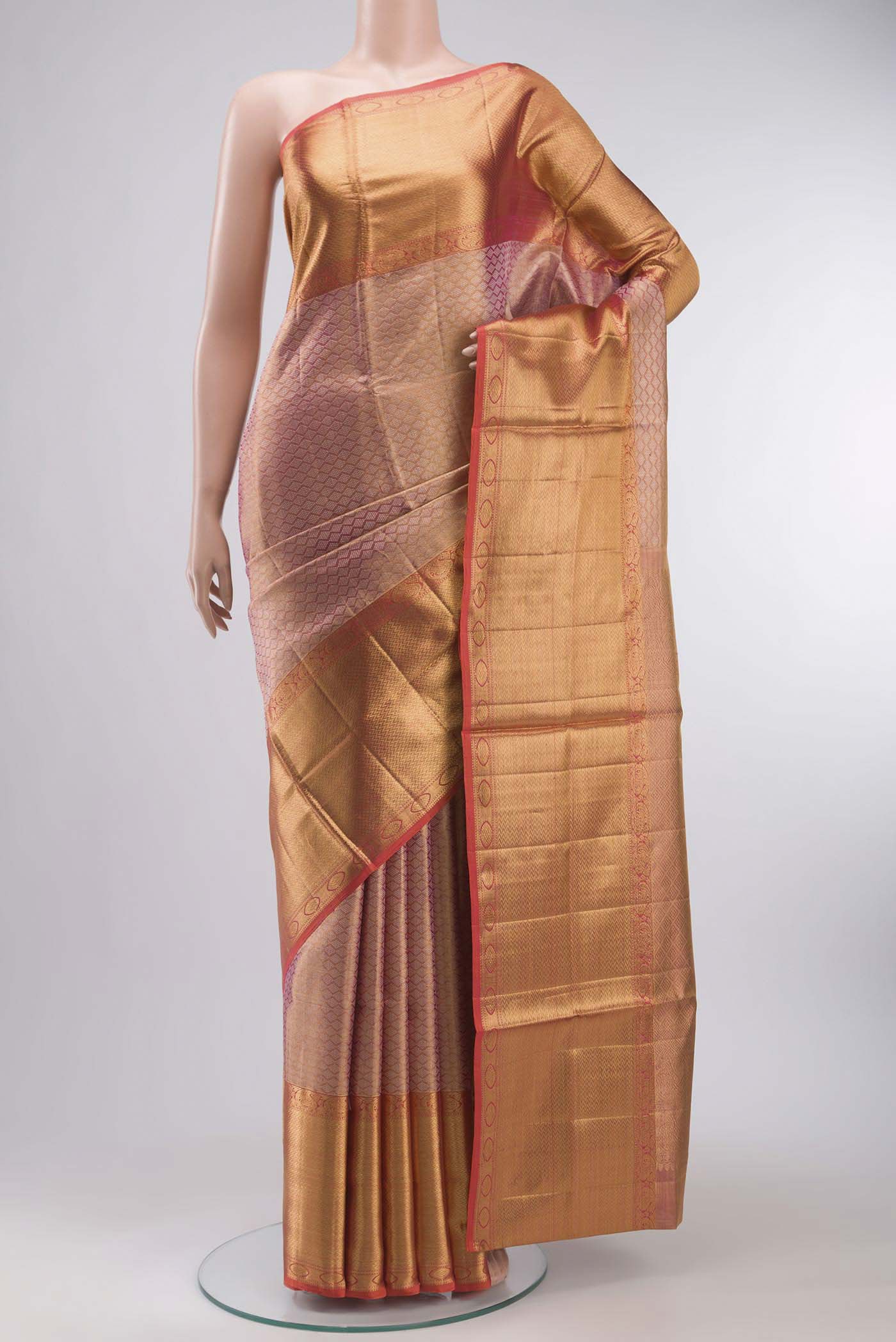Pink with Gold Color Kanchipuram Tissue Silk Saree with Zari Brocade on the body and Zari Border displayed on a mannequin