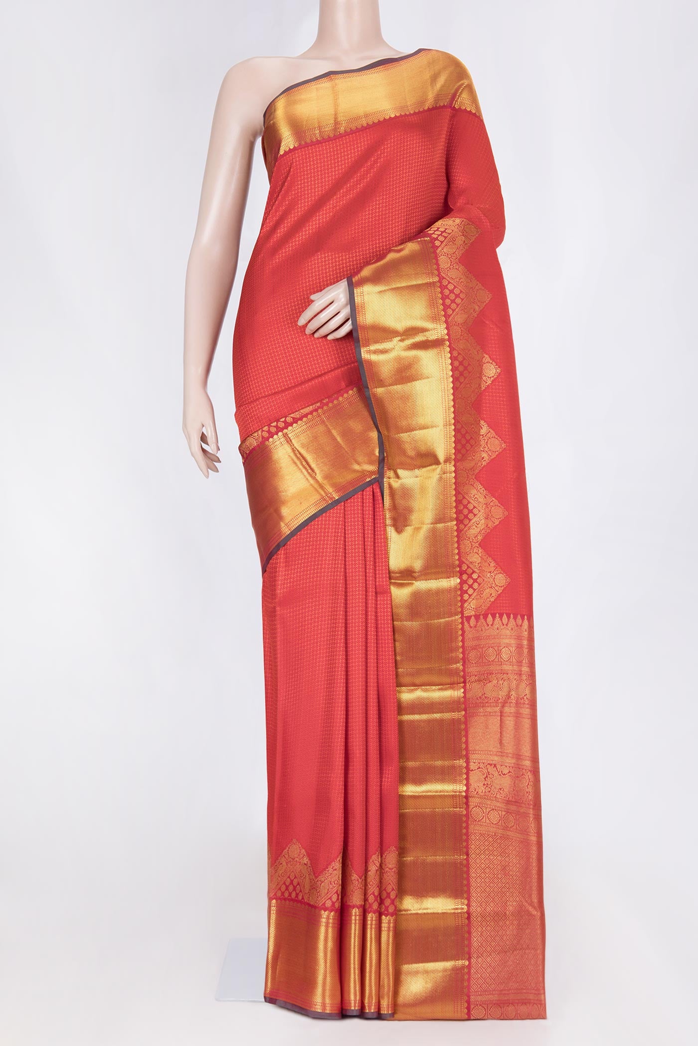 Red Dual Tone Kanchipuram Saree with Jacquard design on the body and Zari Border displayed on a mannequin