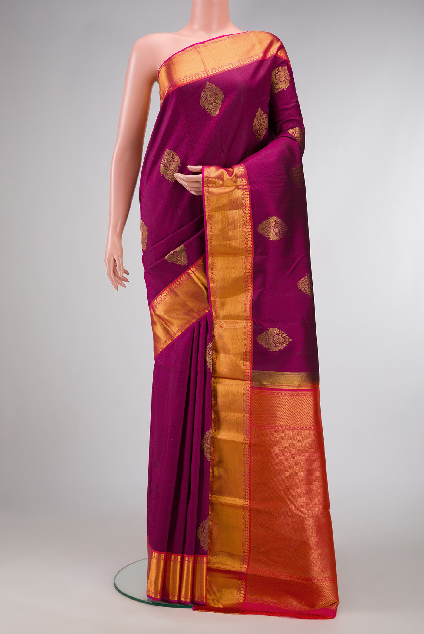 Purple Dual Tone Kanjivaram Silk Nine Yards Saree with Jacquard With Zari Butta on the body and Zari Border.  displayed on a mannequin