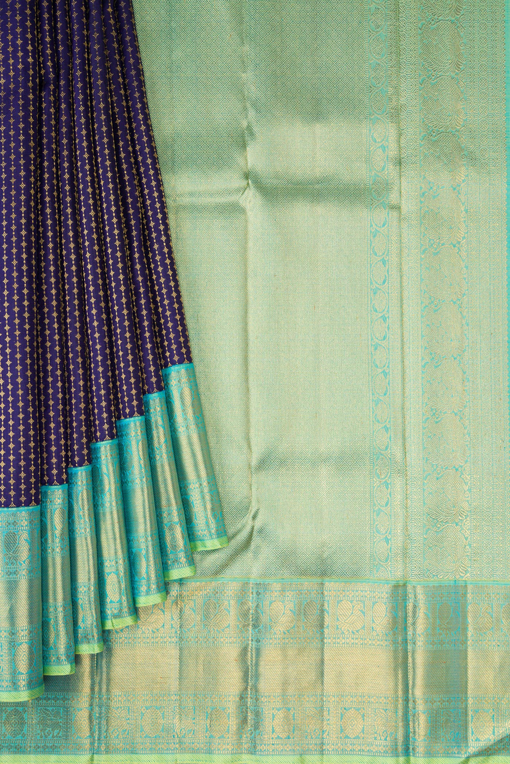 Pleats and pallu of Pure Silk Pure Zari Navy Blue Kanjivaram Saree with Zari Brocade on the body and Zari Border. 