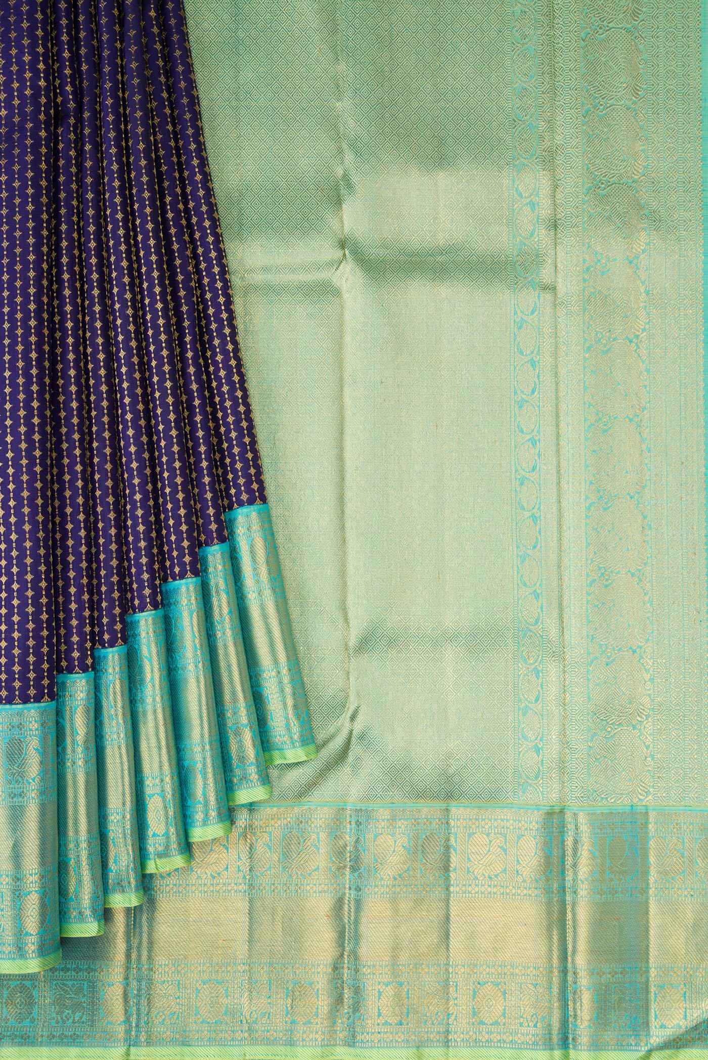 Pleats and pallu of Pure Silk Pure Zari Navy Blue Kanjivaram Saree with Zari Brocade on the body and Zari Border. 