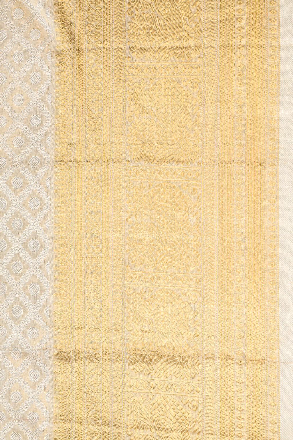 Border image of Gold Dual Tone Kanjivaram Tissue Silk Saree with Zari Brocade on the body and Zari Border. 