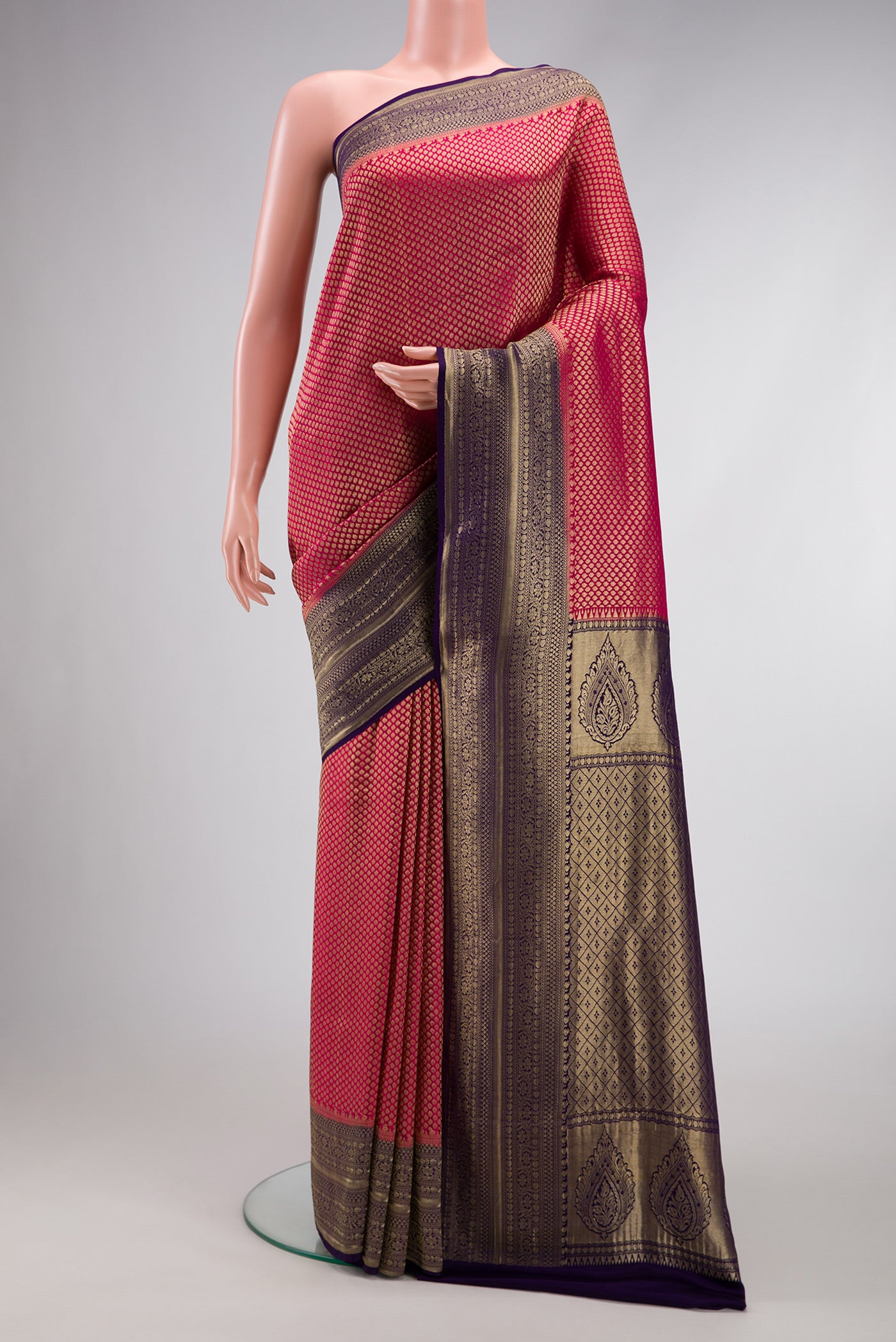Maroon Dual Tone Tussar Silk Saree with Printed design on the body and Zari Border.  displayed on a mannequin