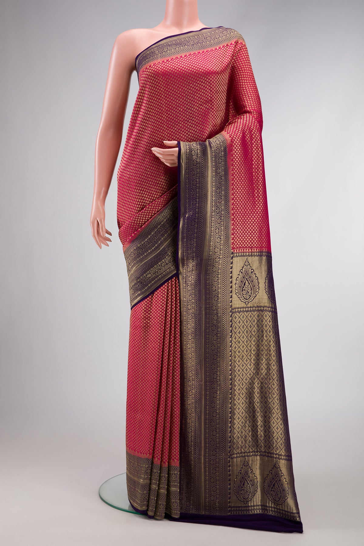 Maroon Dual Tone Tussar Silk Saree with Printed design on the body and Zari Border.  displayed on a mannequin