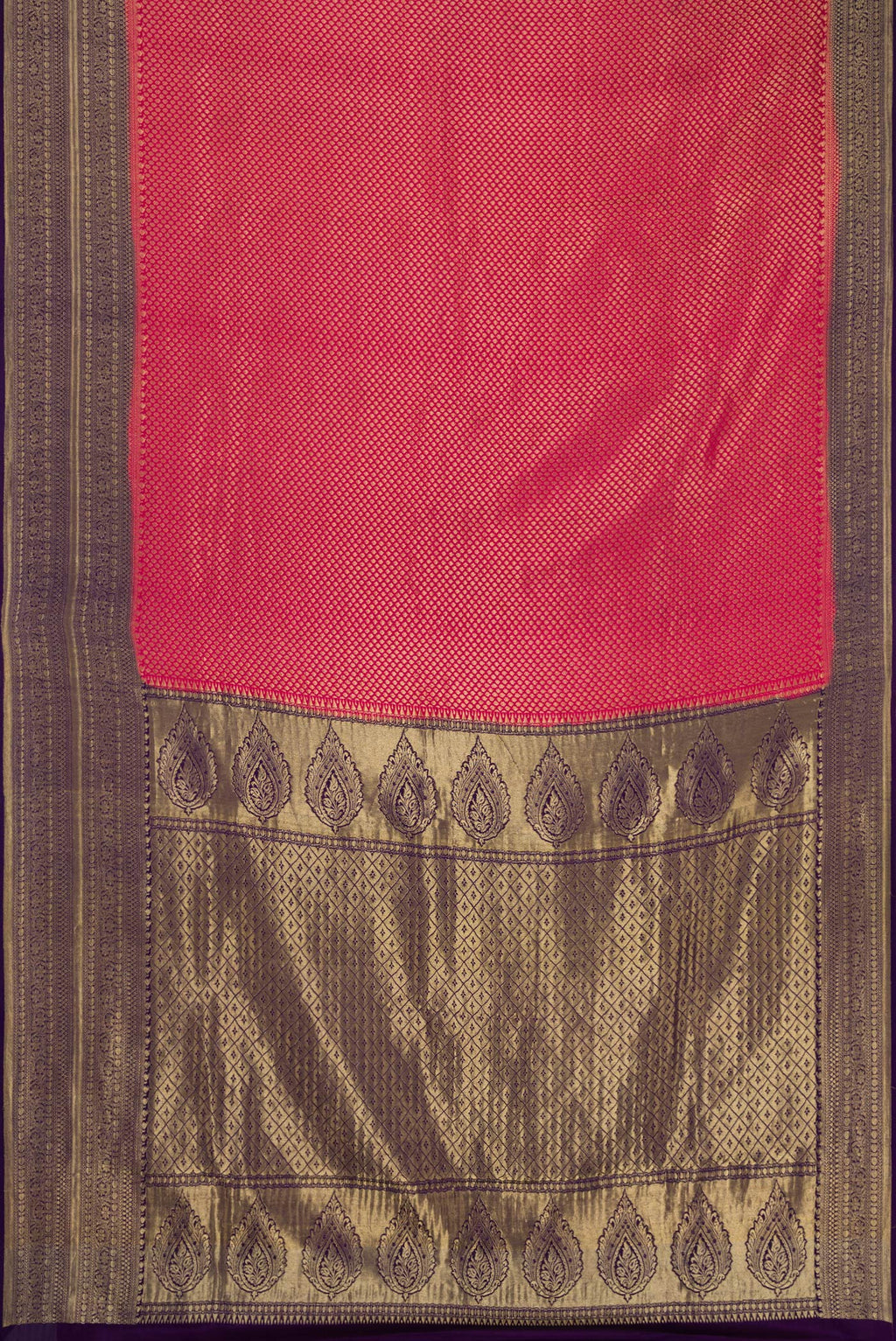 Flat view of Maroon Dual Tone Tussar Silk Saree with Printed design on the body and Zari Border. 