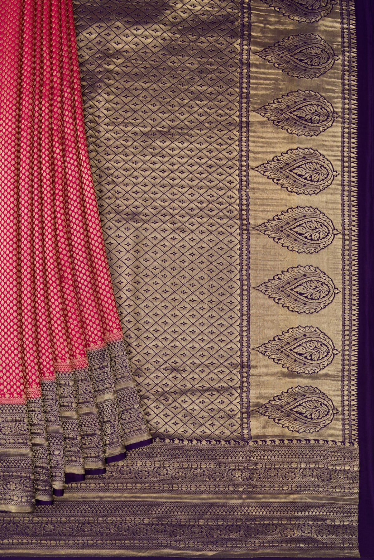 Pleats and pallu of Maroon Dual Tone Tussar Silk Saree with Printed design on the body and Zari Border. 