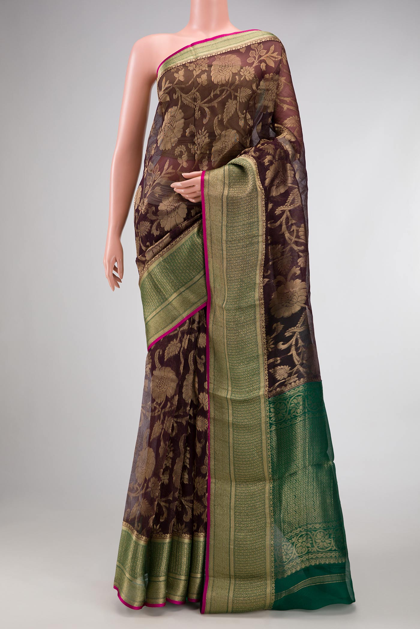Coffee Brown Dual Tone Organza Silk Saree with Zari Brocade on the body and Zari Border.  displayed on a mannequin