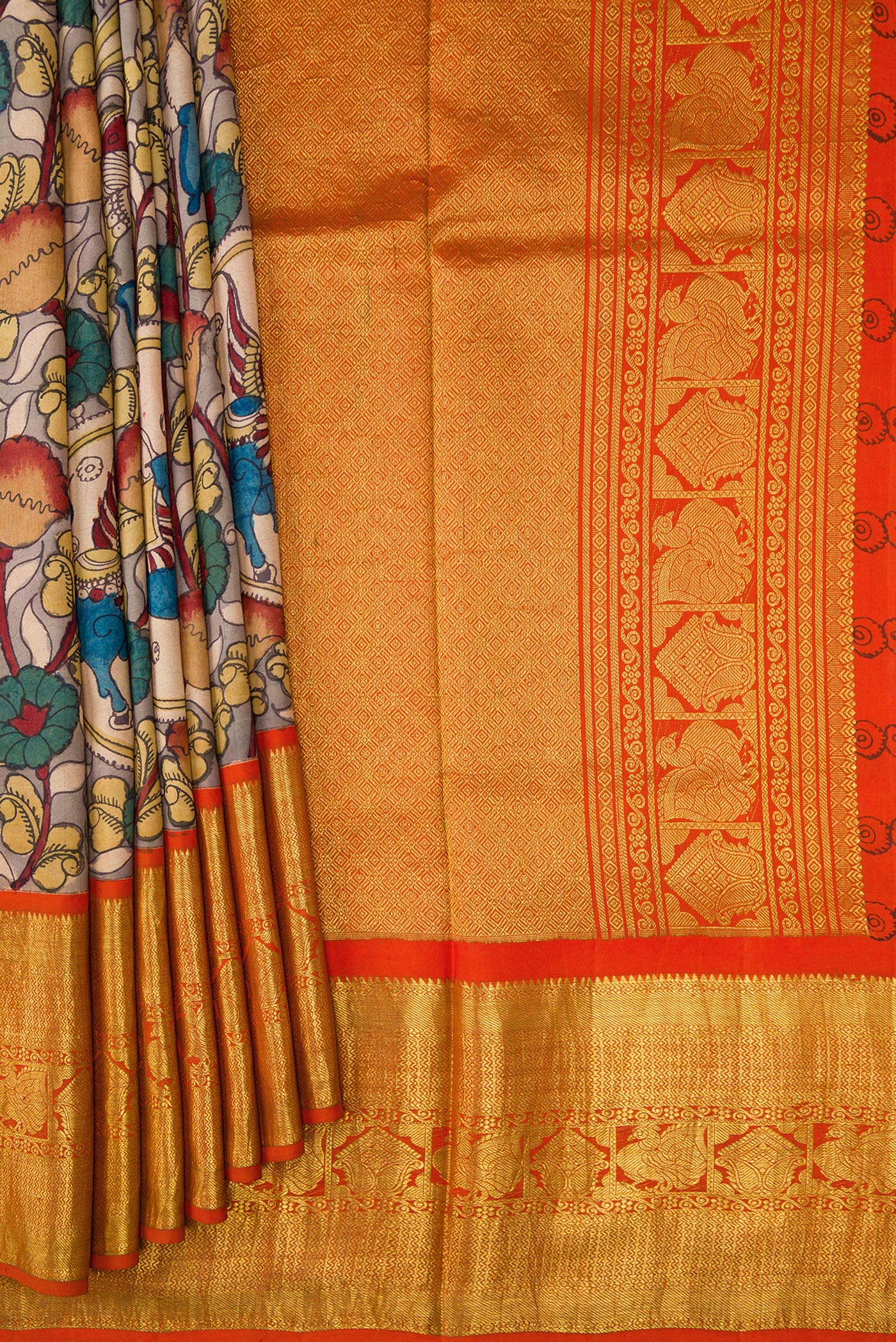Pleats and pallu of Beige Dual Tone Kanchipuram Silk Saree with kalamkari Print on the body and Zari Border. 