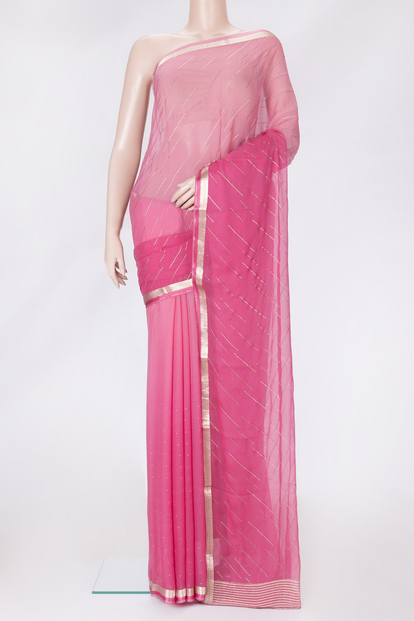 Pink Dual Tone Chiffon Saree with Embroidery on the body and Zari Border.  displayed on a mannequin