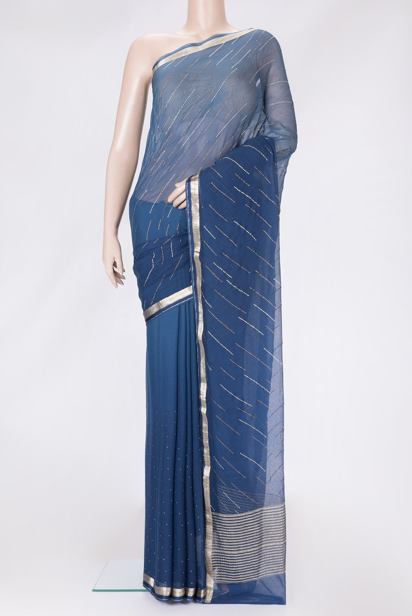 Maya Blue Dual Tone Mysore Georgette Saree with Embroidery on the body and Zari Border.  displayed on a mannequin