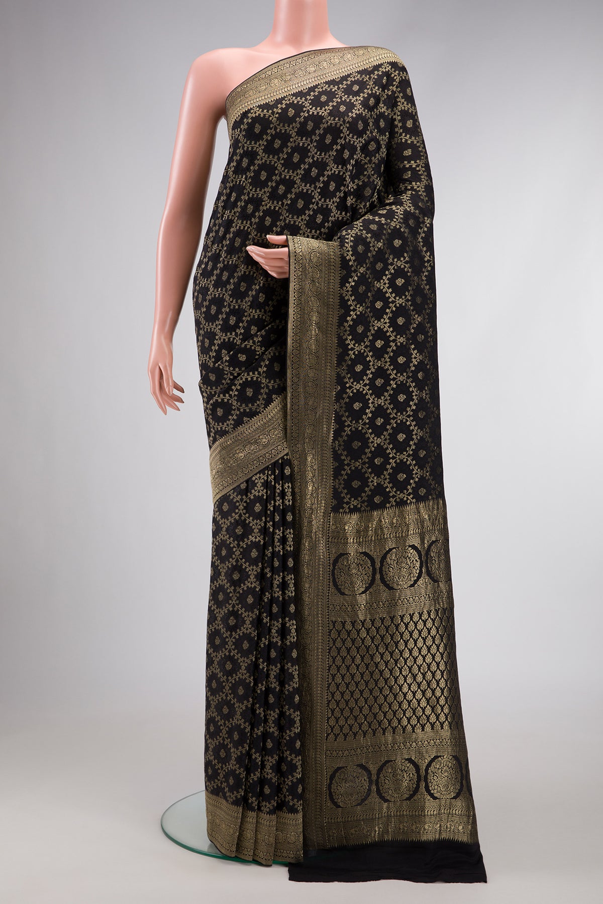 Black Dual Tone Mysore Georgette Saree with Zari Brocade on the body and Zari Border.  displayed on a mannequin