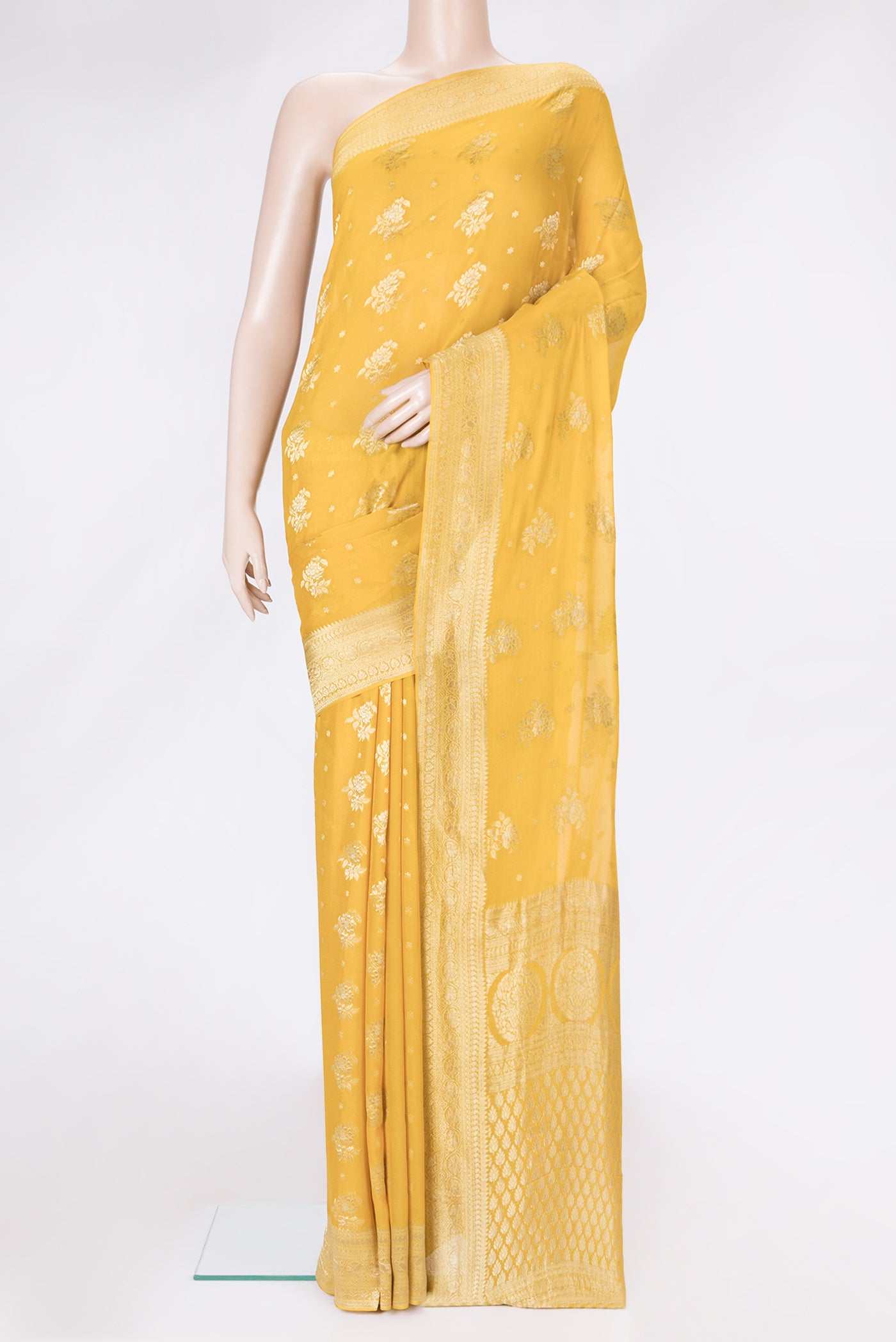 Mustard Dual Tone Mysore Georgette Saree with Zari Butta on the body and Zari Border.  displayed on a mannequin