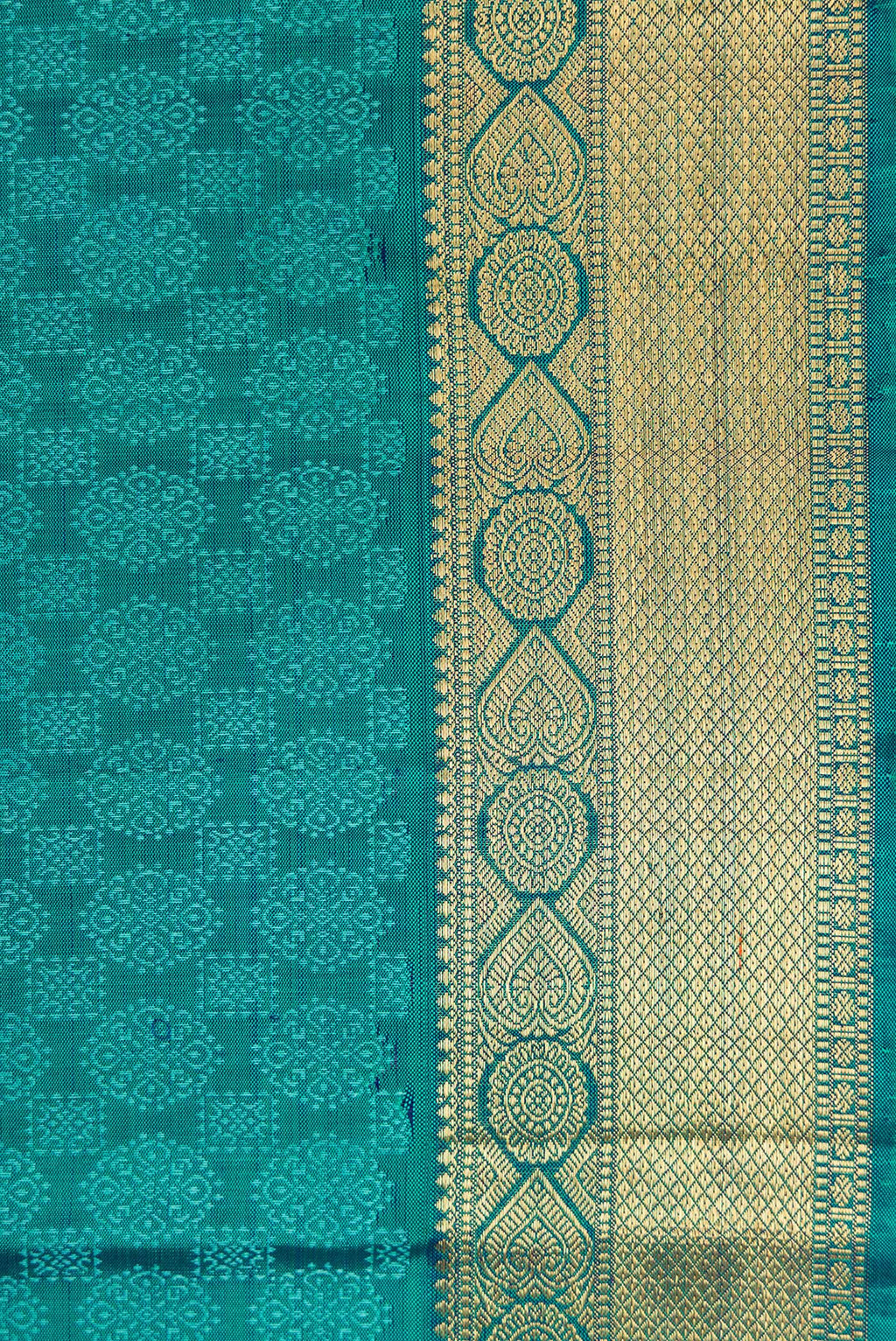 Border image of Peacock Blue Dual Tone Kanjivaram Silk Saree with Jacquard design on the body and Zari Border. 