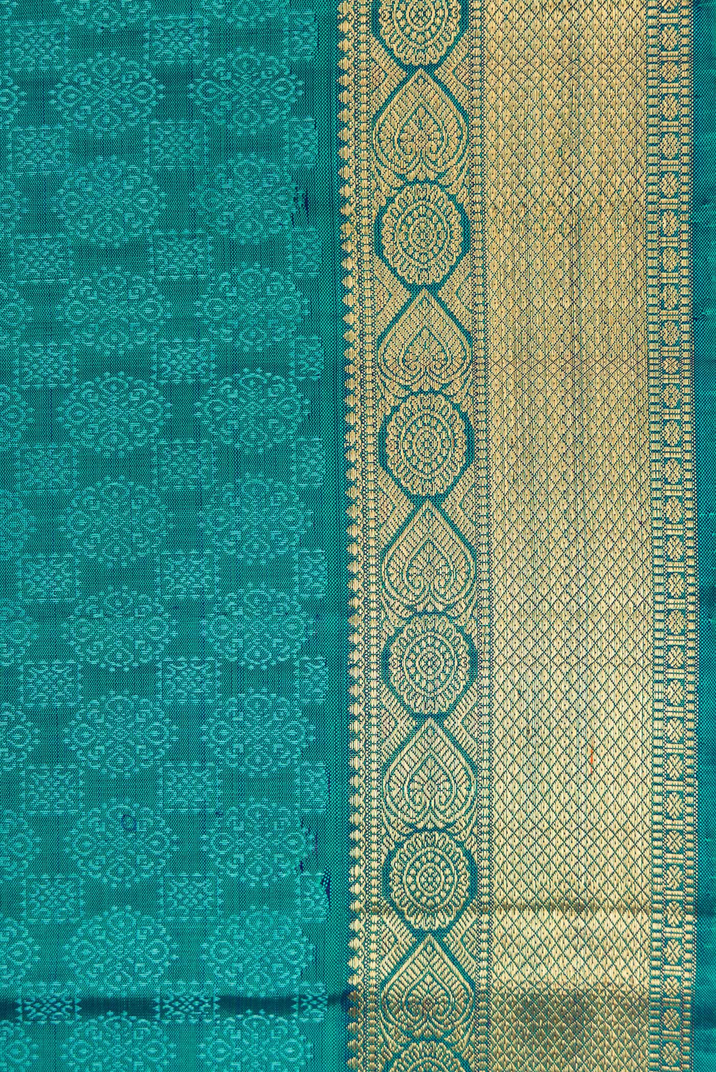 Border image of Peacock Blue Dual Tone Kanjivaram Silk Saree with Jacquard design on the body and Zari Border. 