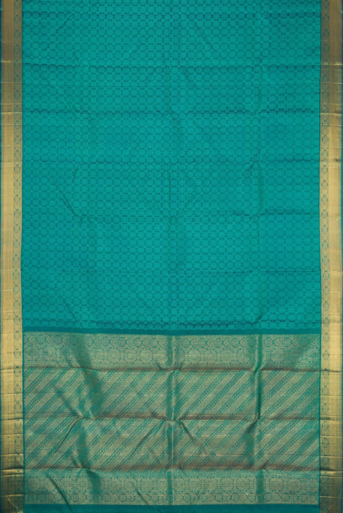 Flat view of Peacock Blue Dual Tone Kanjivaram Silk Saree with Jacquard design on the body and Zari Border. 
