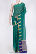 Green Dual Tone Mysore Georgette Saree with Zari Butta on the body and Fancy Border.  displayed on a mannequin