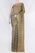 Mehandi Green Dual Tone Tussar Saree with Printed design on the body and Zari Border displayed on a mannequin